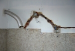 Afbreking en vervanging van een bestaande keuken door een Ixina keuken, nieuwe elektrische bedrading in de muur en het behouden van de oude muurtegels 