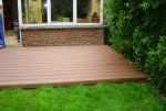 Plaatsing van een Opti-woodÂ® terras, meteen op gras gelegd